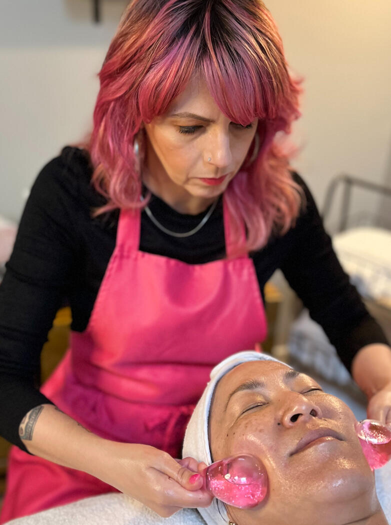 Allison applying a facial